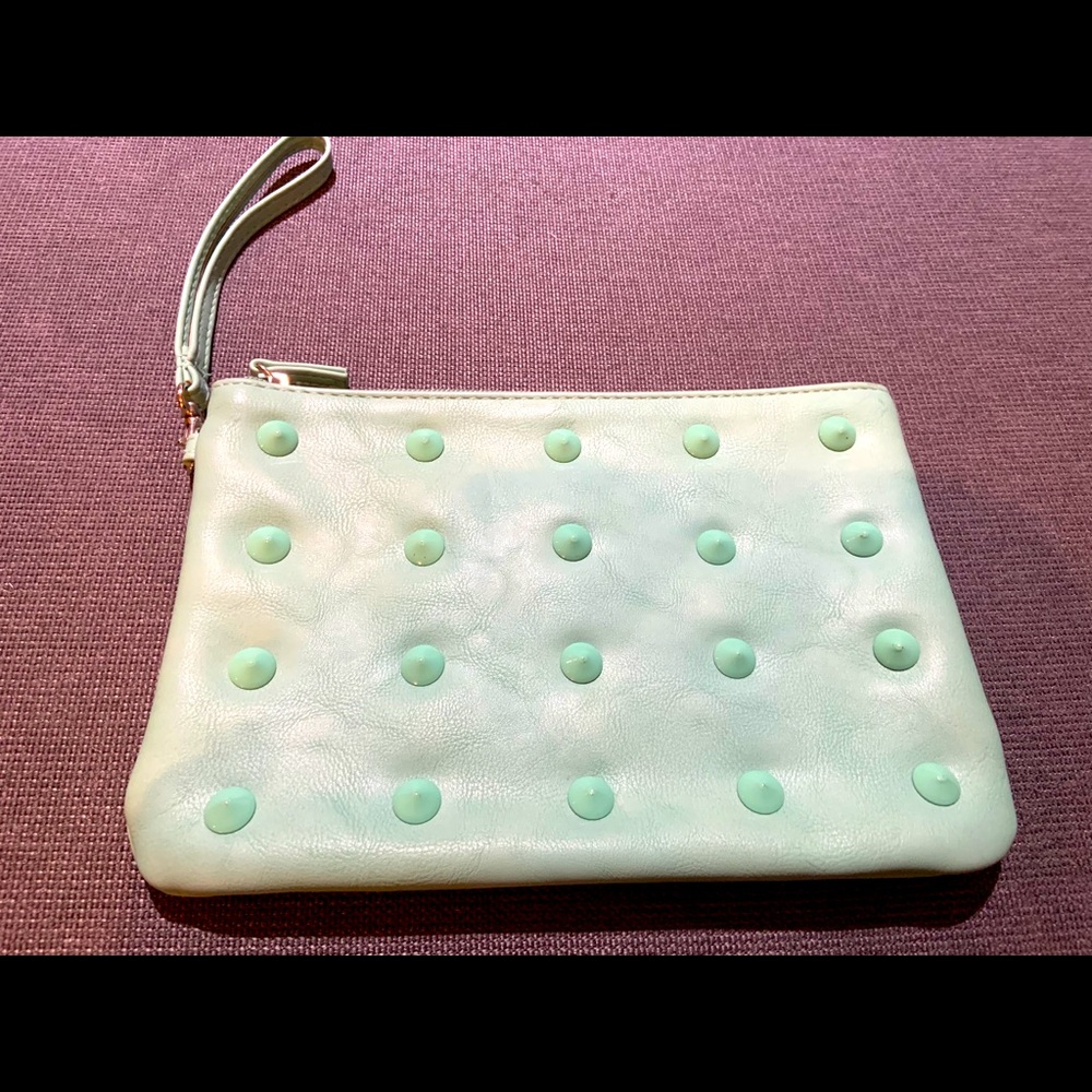 Mint Green purse with design.